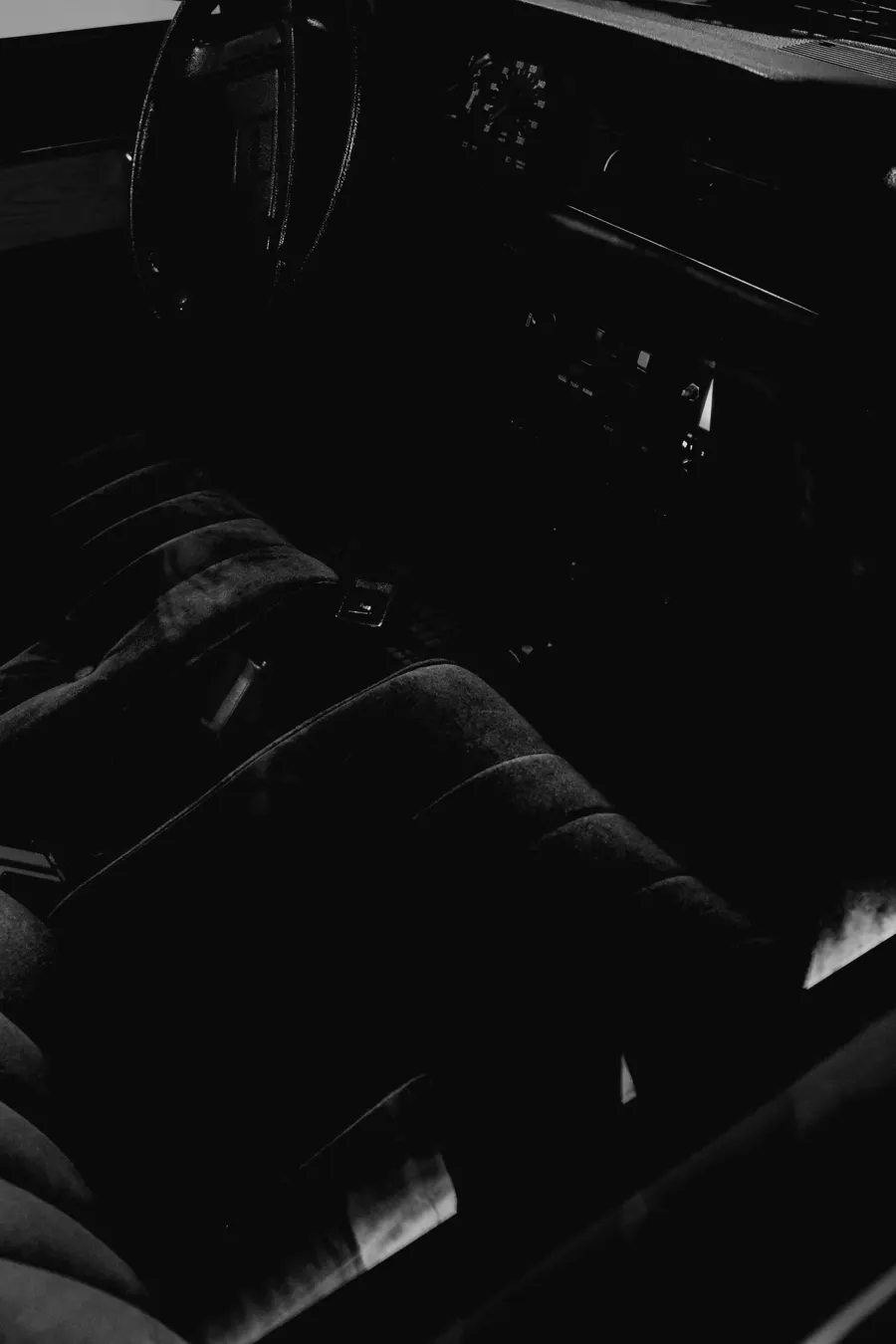 Dark leather seats after an interior detail